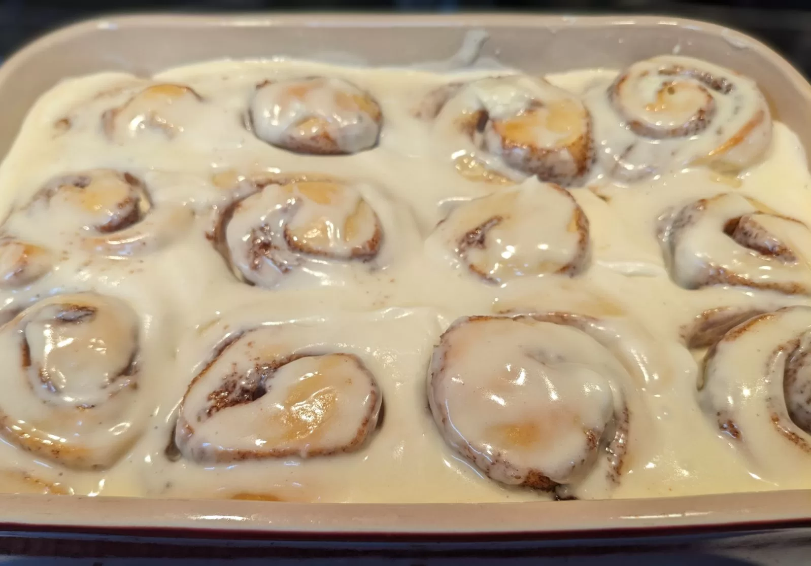 Pan of 12 Cinnamon rolls with icing