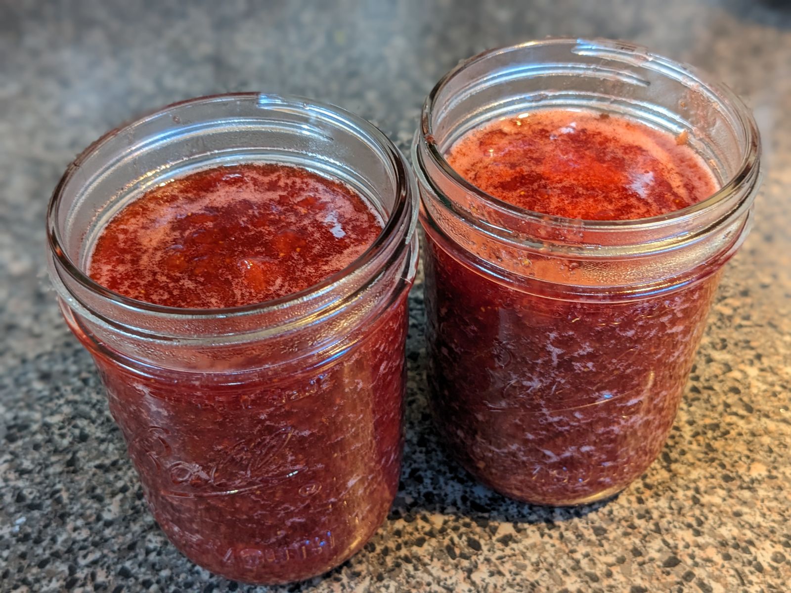 2 pint jars of homemade strawberry jam