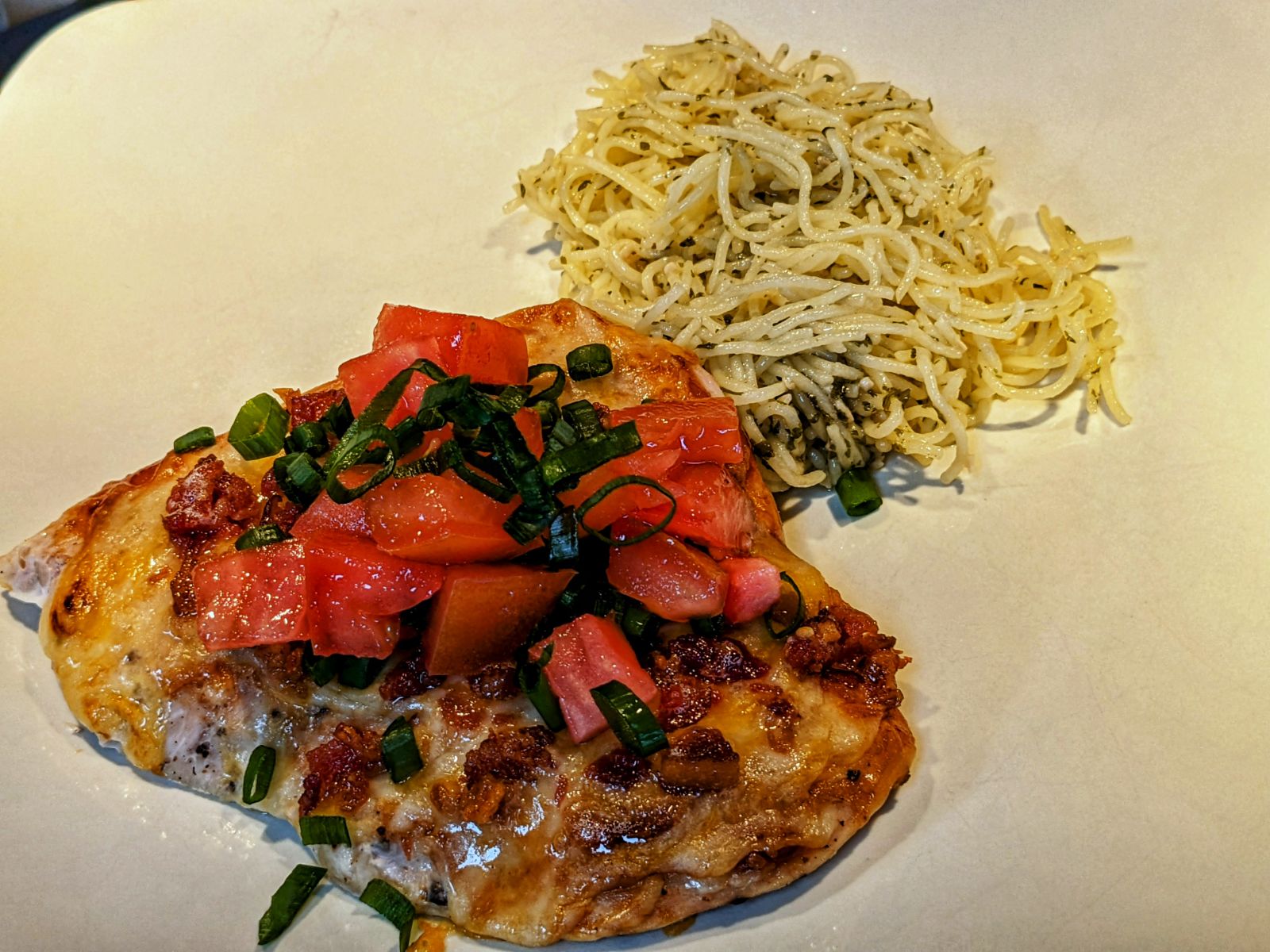 Monterey Chicken with pasta on a white plate