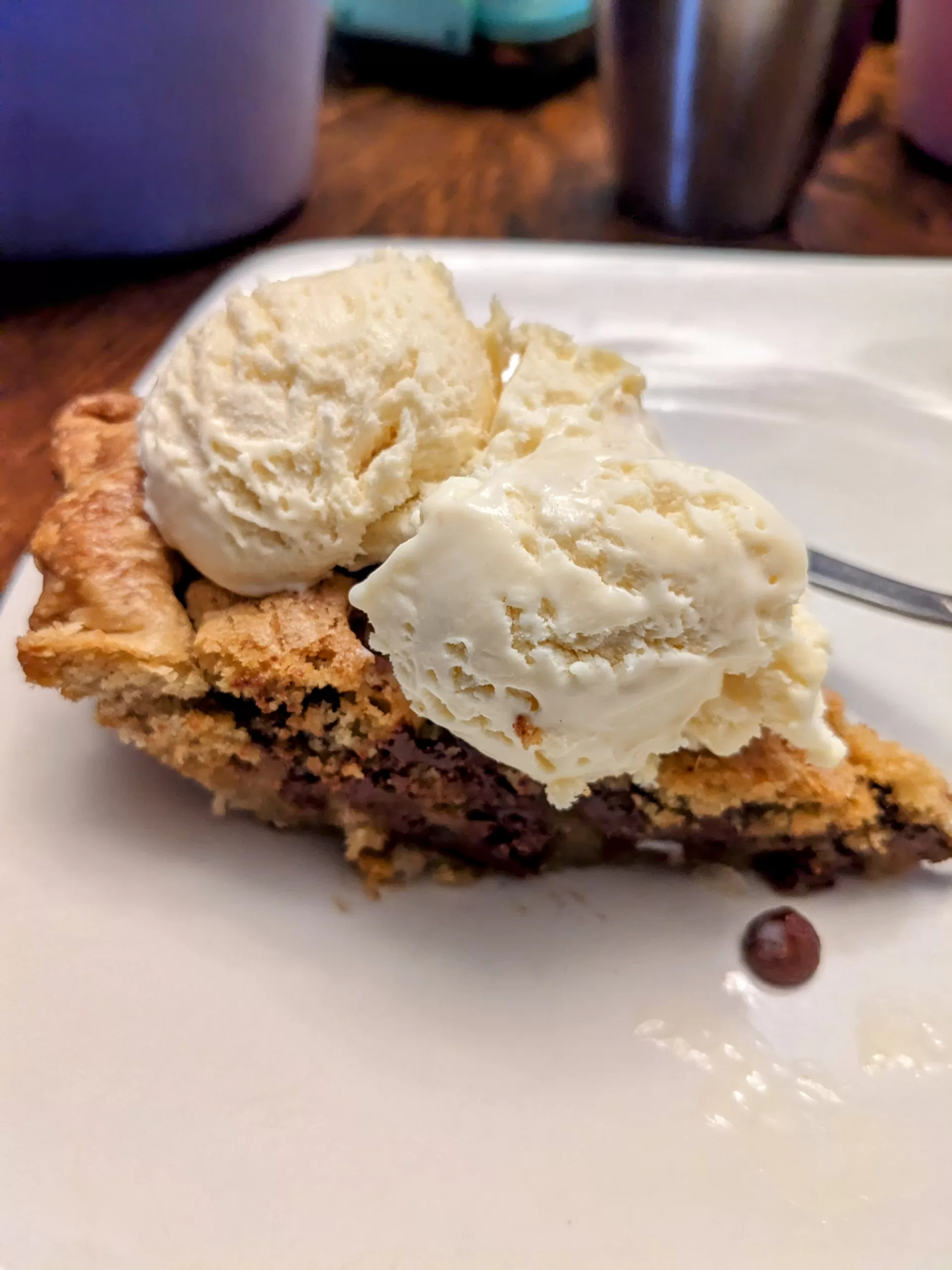 Chocolate chip cookie pie with ice cream on top